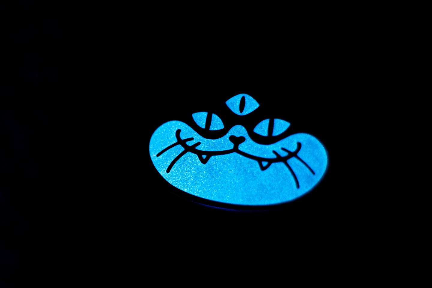 'Three-Eyed Cat' Glow-in-the-Dark Pin by Stacey Robson